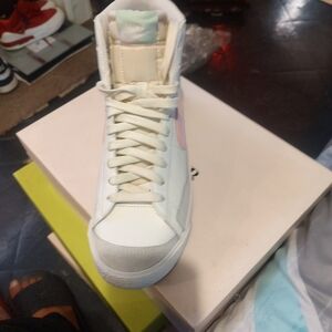 Nike Women’s High-Top Sneaker in White with Pink Swoosh